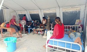 UNICEF staff and the Nepal Army install a medical tent on the premises of the overcrowded Bheri Hospital in Nepalgunj Sub-Metropolitan City, mid-western Nepal.