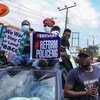 Nigerians protest in Lagos over the now-disbanded and discredited police unit, known as the Special Anti-Robbery Squad, or SARS.