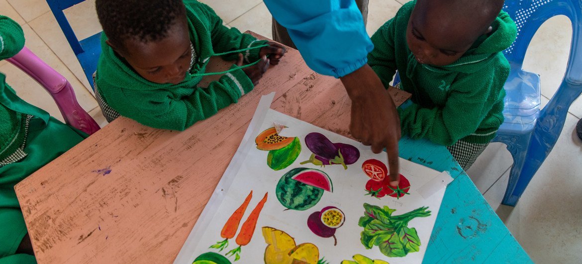 Children learn about fruits and vegetables at a early childhood development centre in Rwanda. (file photo)