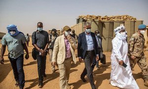 UN peacekeeping chief Jean-Pierre Lacroix, in centre with sunglasses, visited Ménaka, Mali, where he met with the Governor, President of the Interim Authority, armed groups signatories to the peace agreement, civil society and the local commander, among otthers.