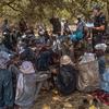A joint team of United Nations police, Central African defense and security forces, and MINUSCA, interact with the population of Kidjidji, to assess the security situation, in Central African Republic