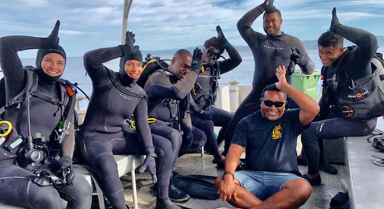 The Beqa Adventure Divers' family of Galoa Village, Fiji, who play a crucial role in protecting the Marine Protected Area. 