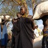 برنامج الأغذية العالمي التابع للأمم المتحدة يوزع الغذاء في بلدة بيبور بجنوب السودان.