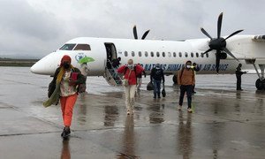 Aid workers arrive in Mekelle in the Ethiopian region of Tigray on the first humanitarian passenger flight there.  