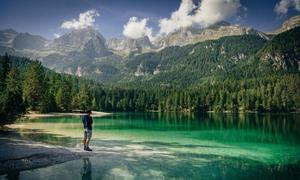 Lake Tovel is one of the most charming alpine lakes of the Dolomites located within the Adamello Brenta Natural Park in Trentino, Italy.