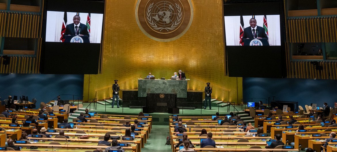 President Uhuru Kenyatta (on screens) of Kenya addresses the general debate of the UN General Assembly’s 76th session.