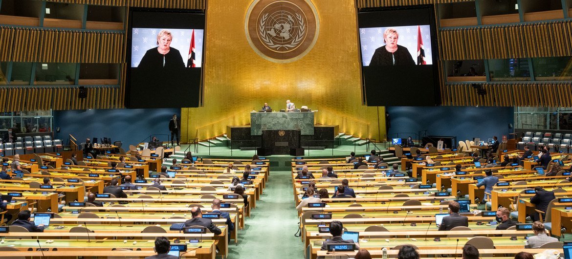 Prime Minister Erna Solberg (on screens) of Norway addresses the general debate of the UN General Assembly’s 76th session.