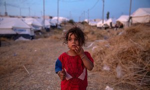 A four-year-old girl wanders in Bardarash camp in Duhok, Iraq, one of thousands of Syria refugees who have fled fighting in the northeast of their country.