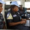 Peacekeepers write a report after patrolling an IDP camp in North Darfur, Sudan.