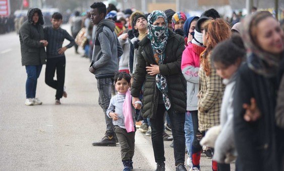 Refugees and migrants gather at the Pazarkule border crossing near Edirne, Turkey, hoping to cross over into Greece.