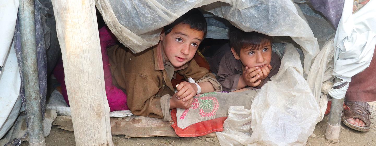 Children shelter and sleep under plastic sheets after a 5.9 magnitude earthquake struck Paktika Province in Afghanistan.
