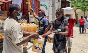 Food is distributed to 3,000 people in Camp Perrin, one of the areas in the south of Haiti that was affected by the earthquake.