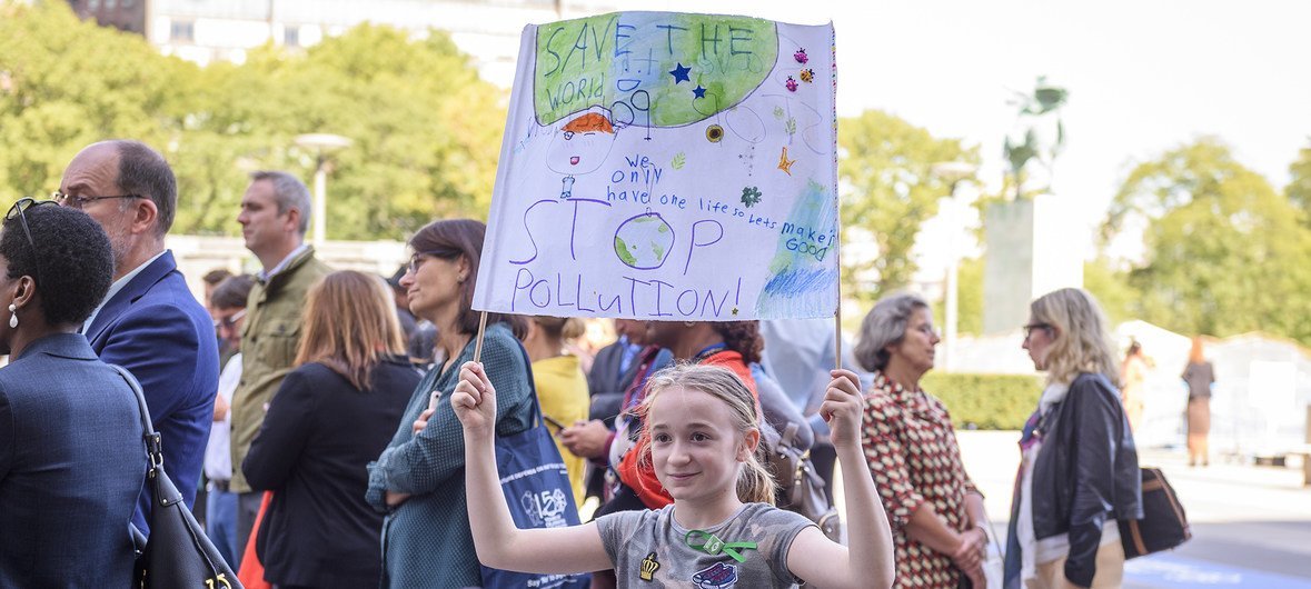 UN staff and their families gather at UN Headquarters in New York in support of the youth-led global climate strike.