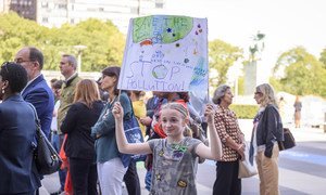UN staff and their families gather at UN Headquarters in New York in support of the youth-led global climate strike.
