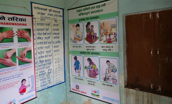Posters in Majhi’s promote the health benefits of using toilets and hand-washing.