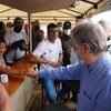 Secretary-General António Guterres talks to villagers in Llano Grande, Colombia, where he witnessed how the peace process was developing in Colombia.