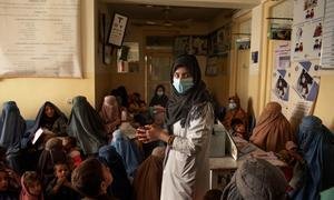 A nutrition nurse talks to women gathered at a UNICEF-supported clinic during a nutrition awareness session in Kandahar, Afghanistan.