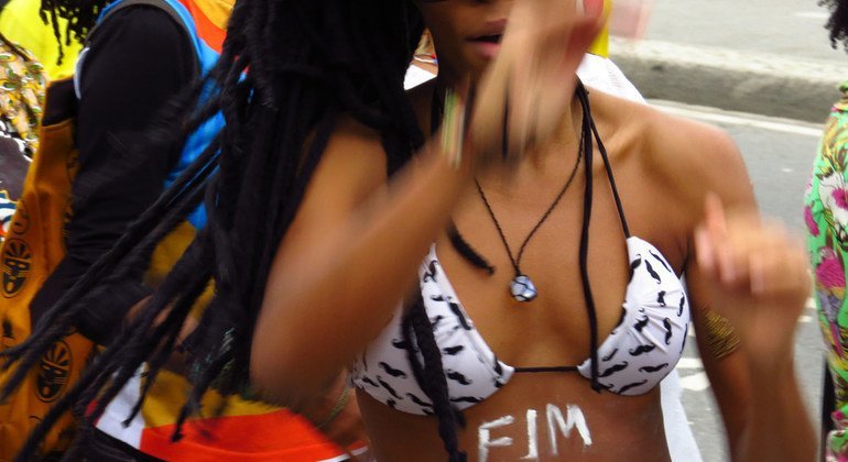 Young Brazilians protest calling for an end to racism.