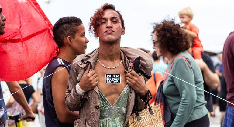 WellDonna Taiz Coelho advocates for her rights on the streets of Rio de Janeiro.  The sticker on her chest reads “stop killing us.”