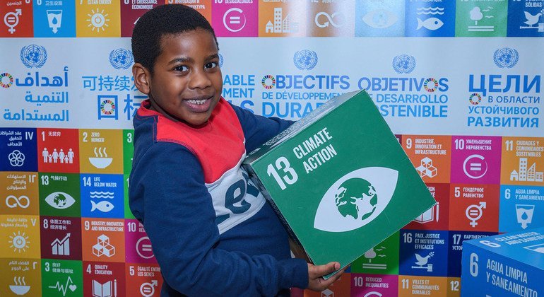 A child plays in the SDG Kids Zone on UN Kids Day 2020.