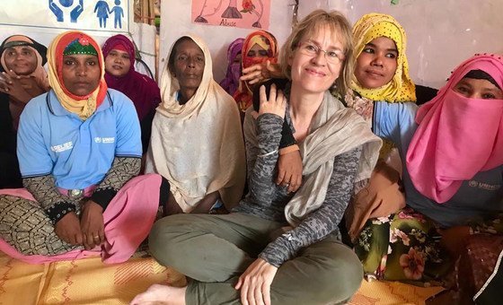 The UN Resident Coordinator in Bangladesh, Mia Seppo (centre), meets refugees in the west of the country in 2019.  