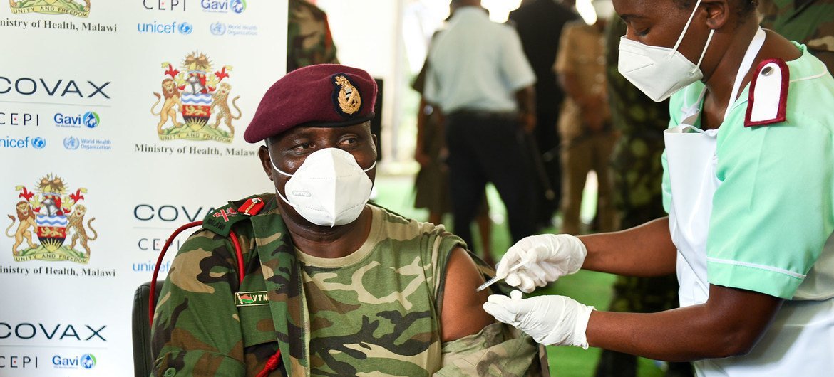 A senior commander in the Malawi Defence Forces is vaccinated against COVID-19.