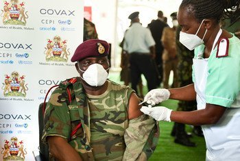 A senior commander in the Malawi Defence Forces is vaccinated against COVID-19.