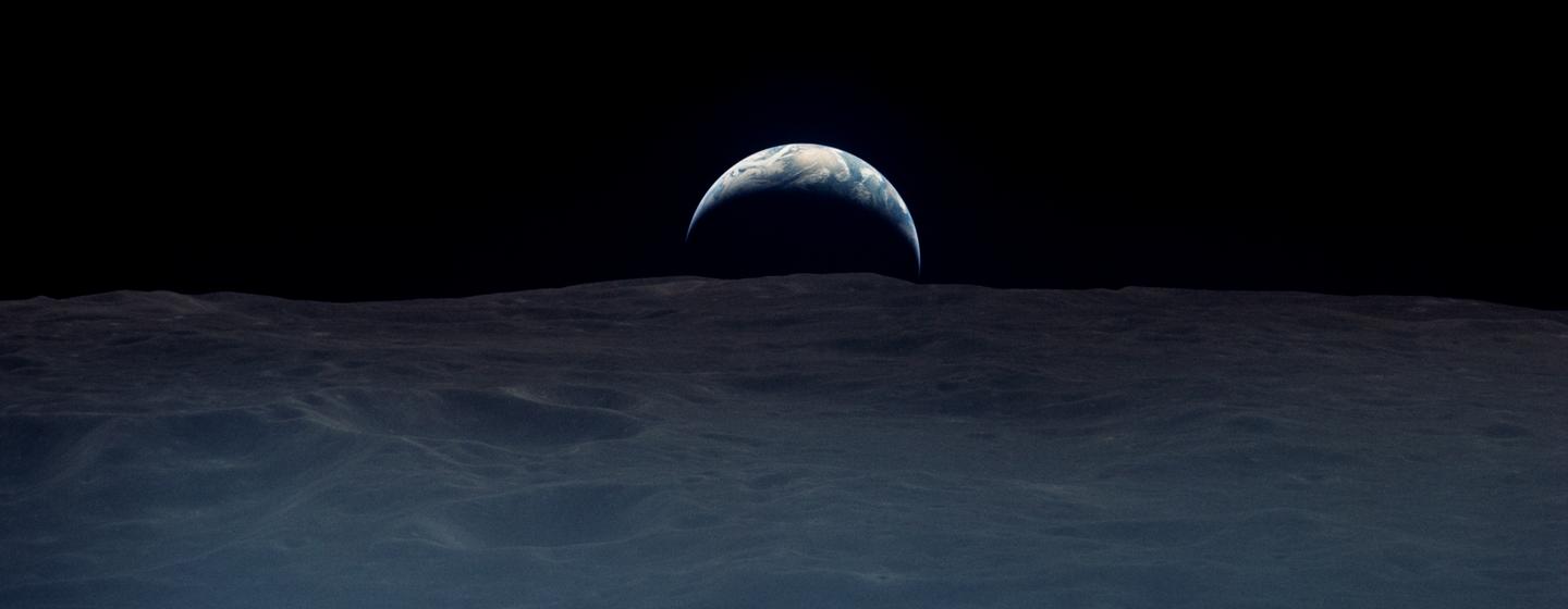 A crescent earthrise captured by a US astronaut in 1969.