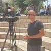 أحد الصحفيين في مدينة القدس الشرقية.