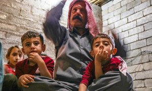 Elias and his family, Yazidis who were heavily persecuted under ISIL, sit on the floor of their home in Zakho, northern Iraq (file photo).