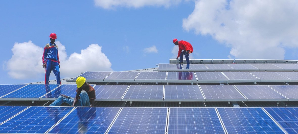 As part of a UNDP-led green renovation project, technicians install solar panels at a police academy in Rajaf, South Sudan. (21 August 2018)