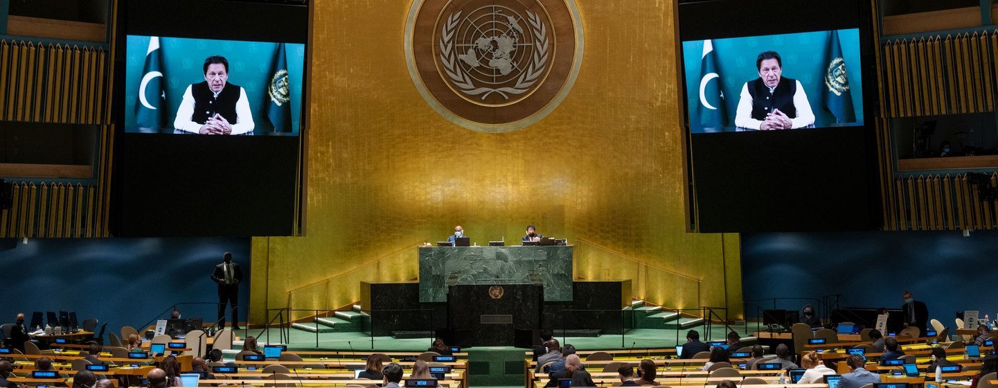 Prime Minister Imran Khan (on screen) of Pakistan addresses the general debate of the UN General Assembly’s 76th session.