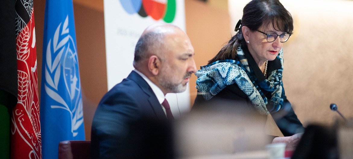Mohammad Haneef Atmar (left), Minister of Foreign Affairs of Afghanistan confers with Deborah Lyons, Special Representative of the Secretary-General of the United Nations for Afghanistan at the UN in Geneva. 
