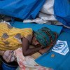 一名埃塞俄比亚难民在苏丹哈姆代特的一处接待中心内休息。