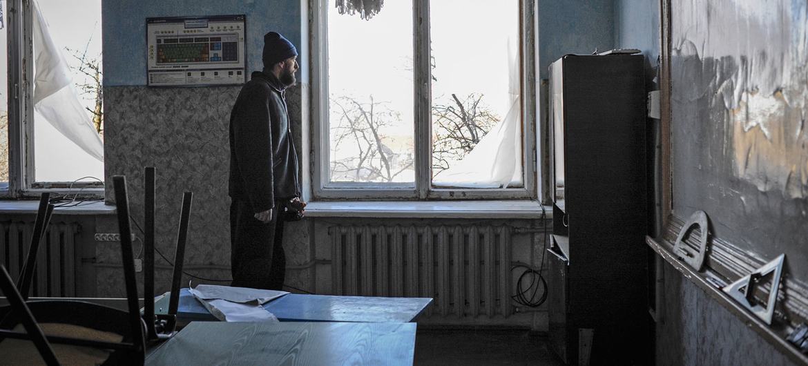 A man stands in a school that was damaged by constant shelling in Oleksandrivka, near Donetsk, Ukraine. (file)