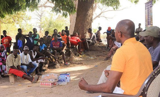 Community members participate in a traditional 'bantaba' session