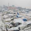 Засыпанный снегом городок для внутренних переселенцев, расположенный на северо-западе Сирии. 