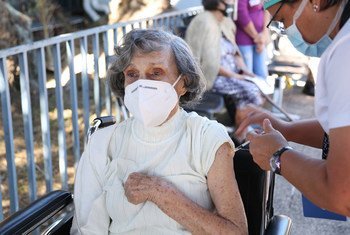 An elderly woman receives her COVID-19 vaccination in Costa Rica.