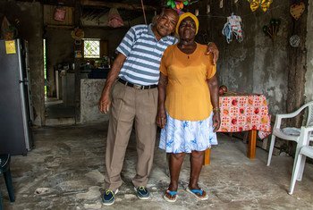 Colombian refugee Agapito Escobar with his wife, Wilma, at home in San Lorenzo, Ecuador.