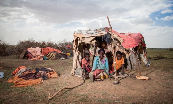 An internally displaced woman sits in a makeshift tent with her two grandchildren in the Wajaale district in Somalia. They were forced to move from Haro-Sheikh due to the severe drought.