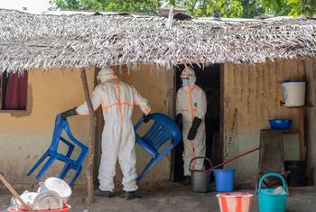 A UNICEF-supported sanitation team decontaminates a house in Mbandaka, where a person suspected of contracting Ebola stayed. 