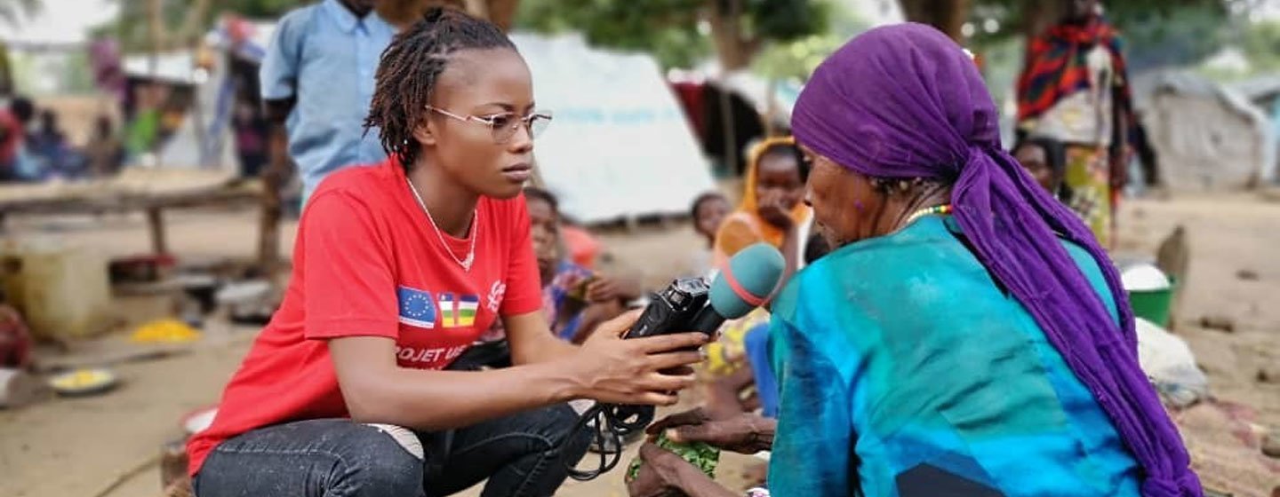 Central African reporter Merveille Noella Mada-Yayoro reporting on conditions at Birao IDP camp. for Guira FM, the UN peace mission's radio in CAR.