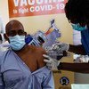 Man get COVID-19 vaccination in South Sudan.