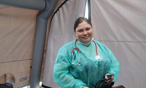 Olena now works alongside Maksym in an IOM mobile clinic in the town of Belz bordering Poland in western Ukraine.