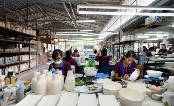 Women work in a ceramics factory in Chiang Mai, northern Thailand.