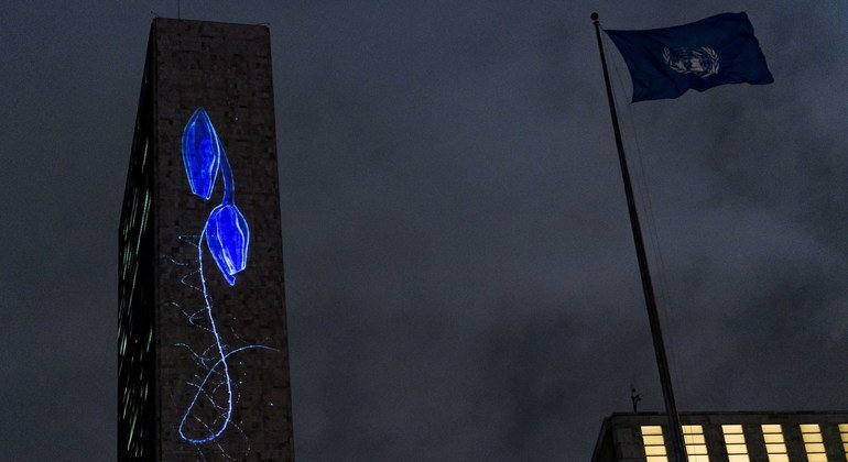 The art work, Vertical Migration, is projected onto the UN Secretariat building in support of the Sustainable Development Goals.