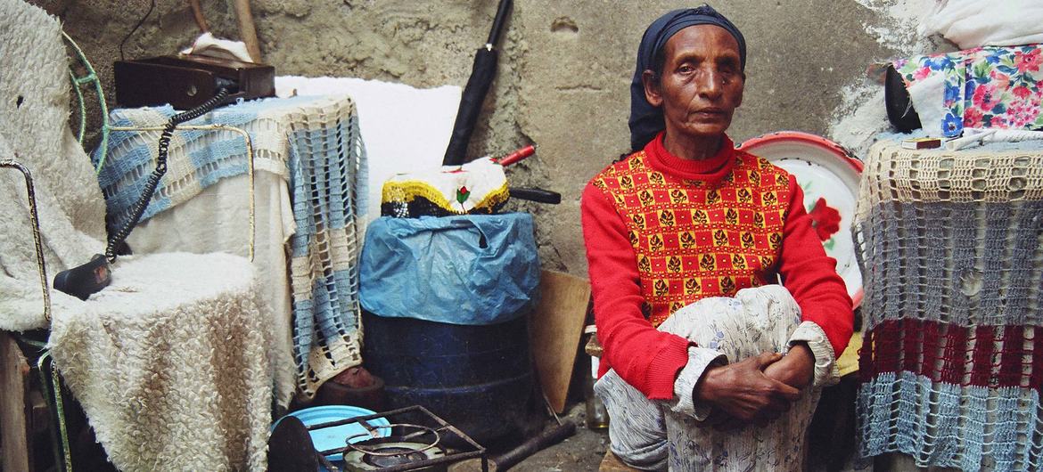 A trader affected by leprosy waits for customers in Addis Ababa, Ethiopia.