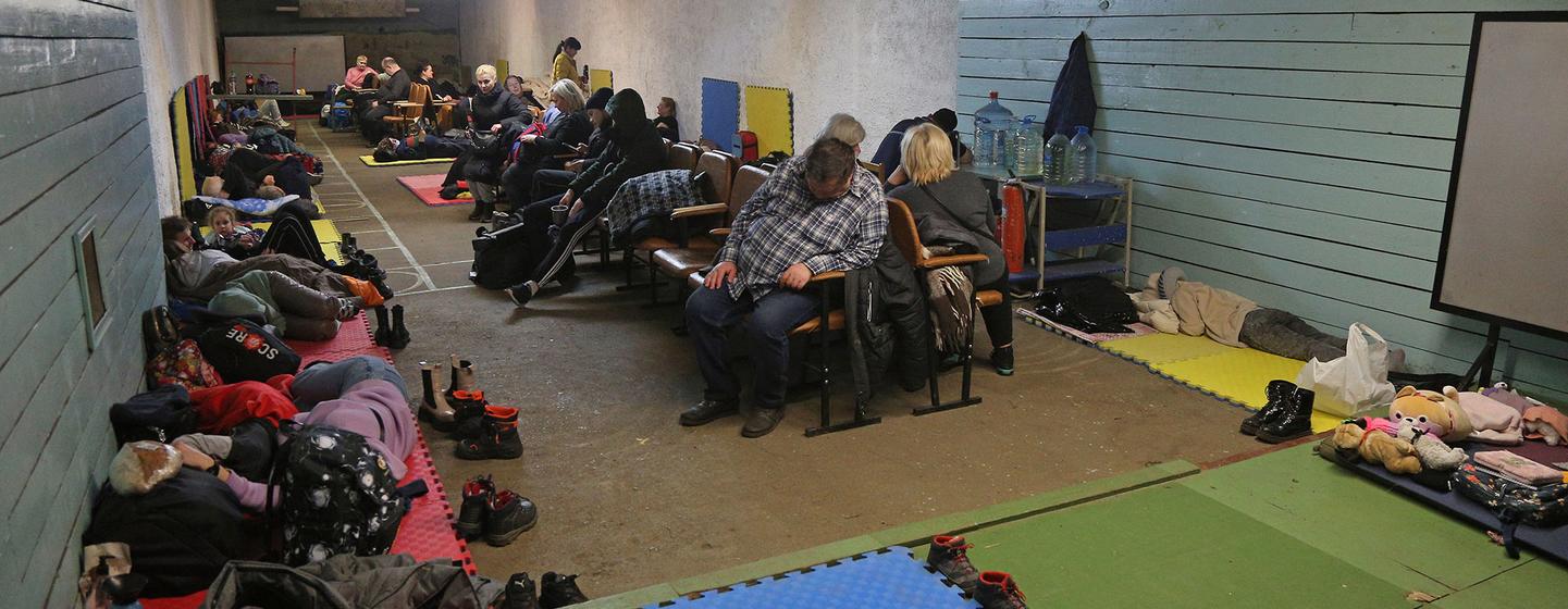 On 25 February 2022, people shelter in a school during ongoing military operations in Kyiv, Ukraine.