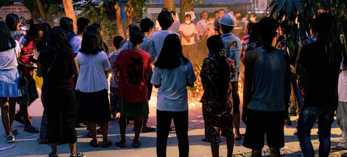 People across ethnic and religious divides hold vigil in Yangon, Myanmar.