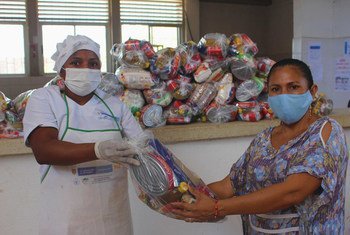 Take-home rations are given to parents of children in Colombia who are missing out on school meals due to COVID-19 school closures.